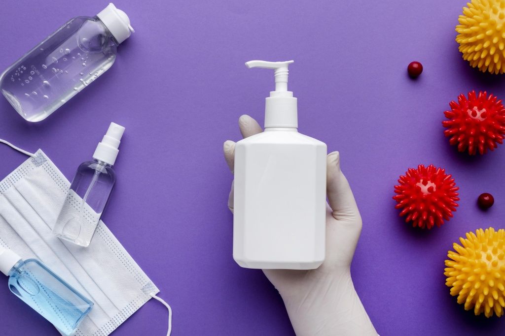 top-view-hand-holding-liquid-soap-dispenser-with-viruses.jpg top-view-hand-holding-liquid-soap-dispenser-with-viruses (1).jpg